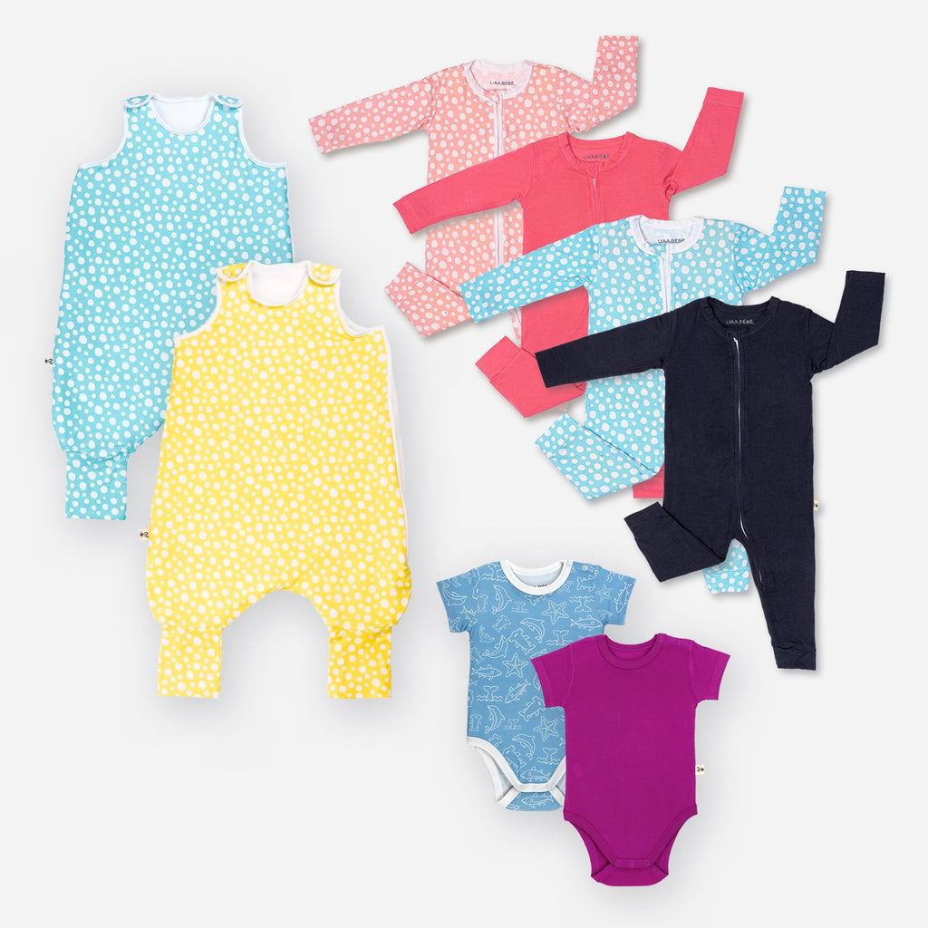 10 részes tipegő gyerekruha csomag, benne bodyk, kezeslábasok és hálózsákok